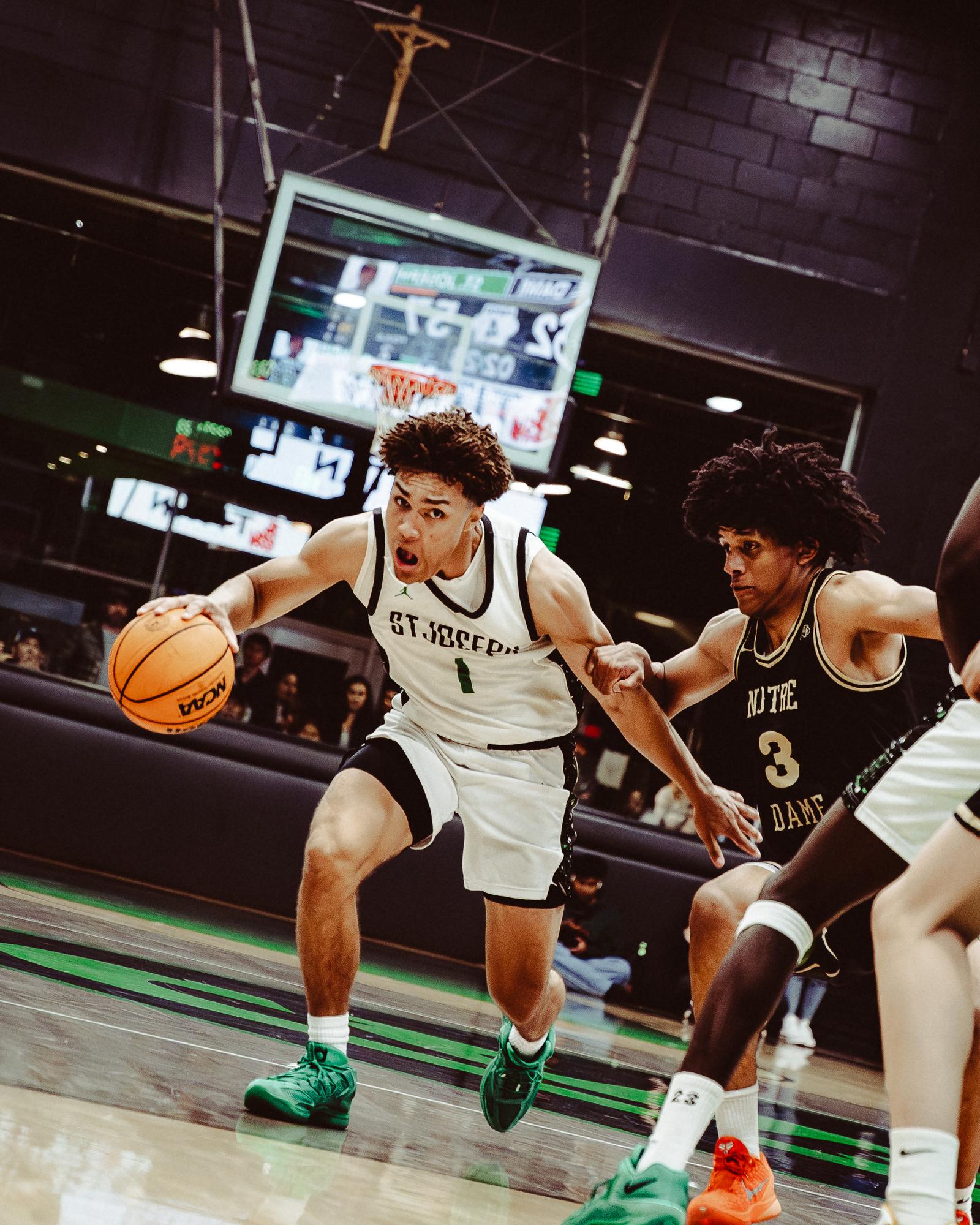 St. Joseph guard driving the lane
