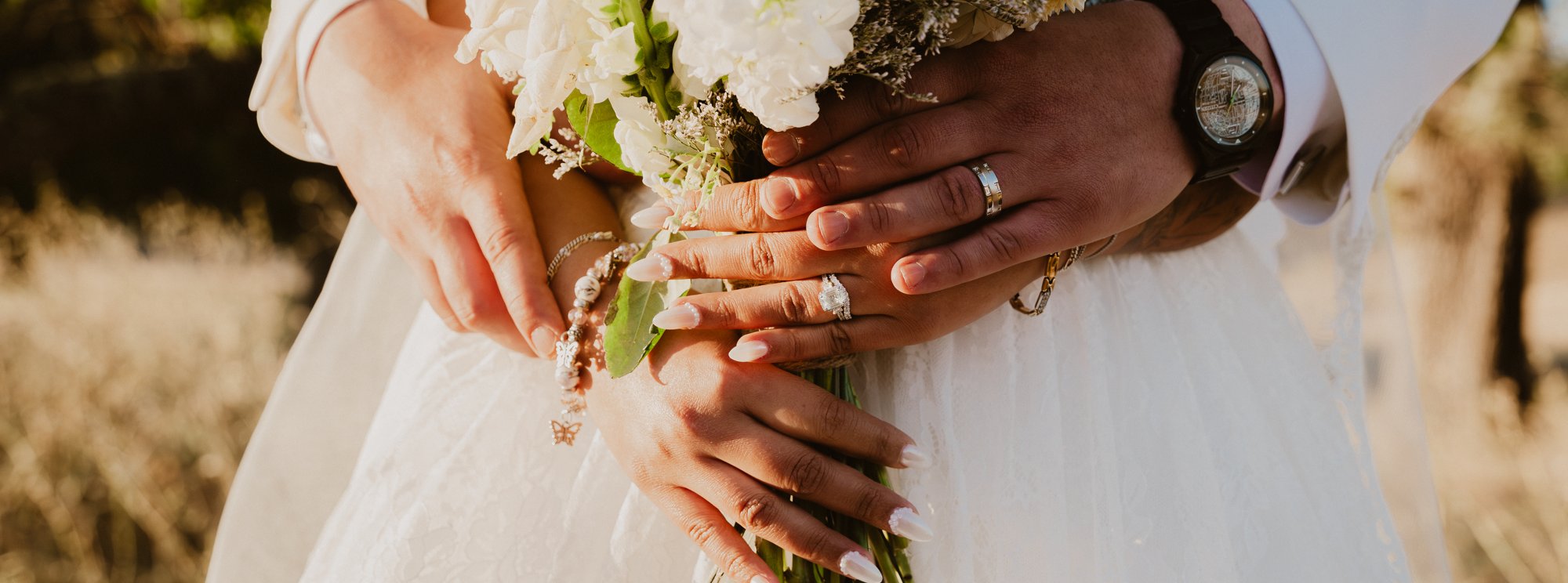 Wedding — ring and bouquet detail